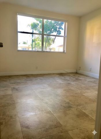 8721 Wiles Road 104, Coral Springs, FL 33067