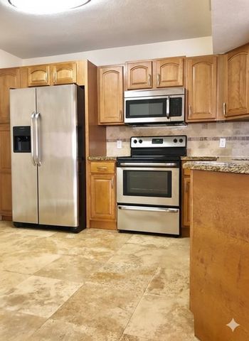 8721 Wiles Road 104, Coral Springs, FL 33067