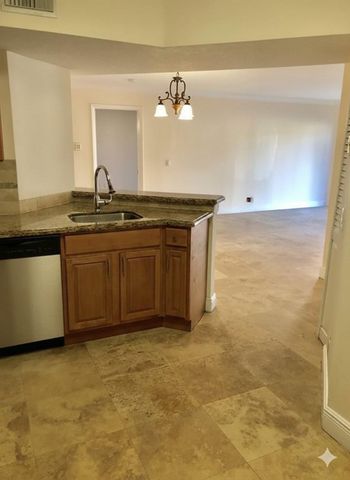 8721 Wiles Road 104, Coral Springs, FL 33067