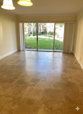 8721 Wiles Road 104, Coral Springs, FL 33067