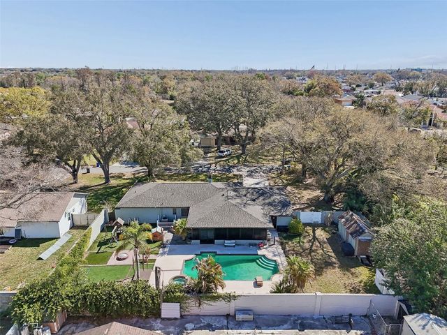 7810 N CAMERON AVENUE, Tampa, FL 33614