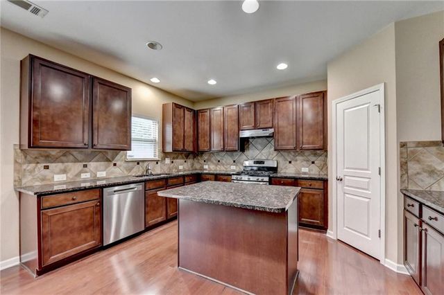 4228 Woods Creek Lane, Suwanee, GA 30024