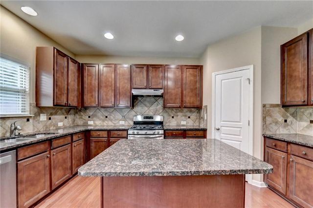 4228 Woods Creek Lane, Suwanee, GA 30024