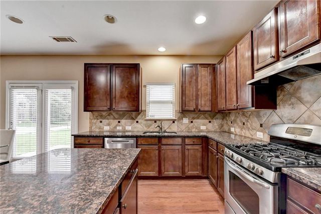 4228 Woods Creek Lane, Suwanee, GA 30024
