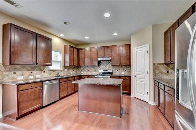 4228 Woods Creek Lane, Suwanee, GA 30024