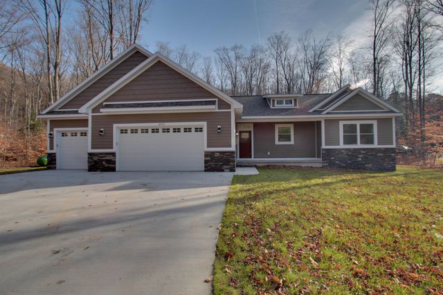 8932 Acres Run Drive, Long Lake Twp, MI 49684