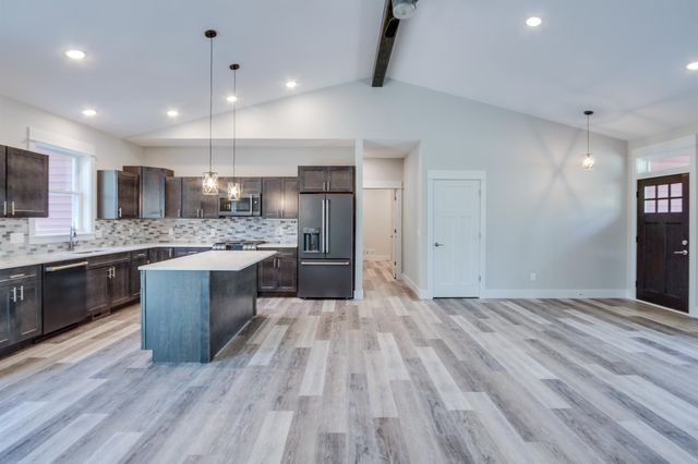 8932 Acres Run Drive, Long Lake Twp, MI 49684