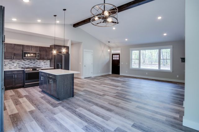 8932 Acres Run Drive, Long Lake Twp, MI 49684