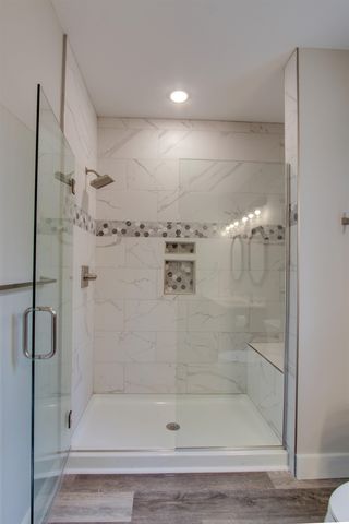 8932 Acres Run Drive, Long Lake Twp, MI 49684