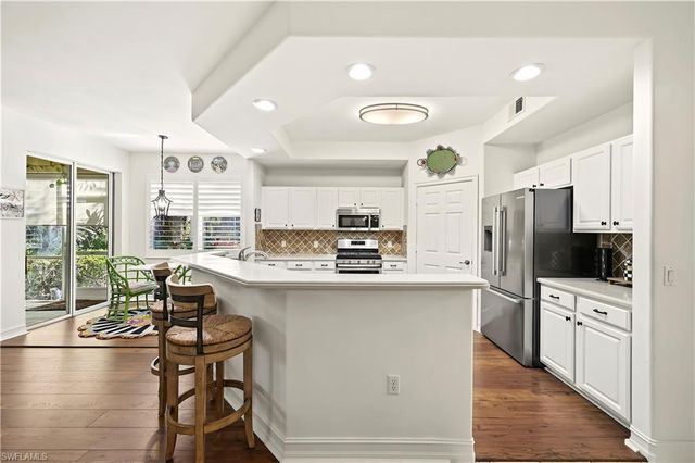 2028 Tarpon Bay DR N # 102, Naples, FL 34119