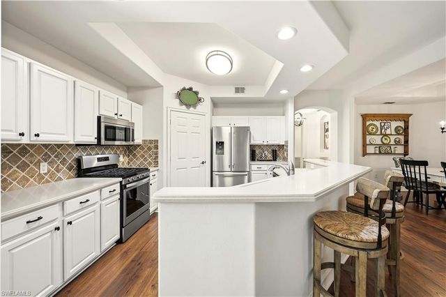 2028 Tarpon Bay DR N # 102, Naples, FL 34119