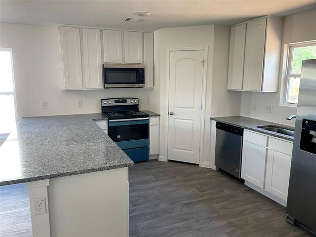 15111 Sorrento Bay Circle Drive, Willis, TX 77318