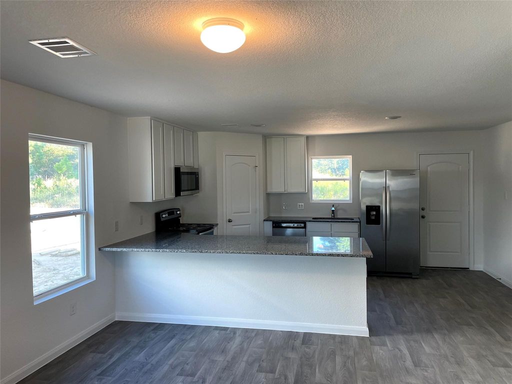 15111 Sorrento Bay Circle Drive, Willis, TX 77318