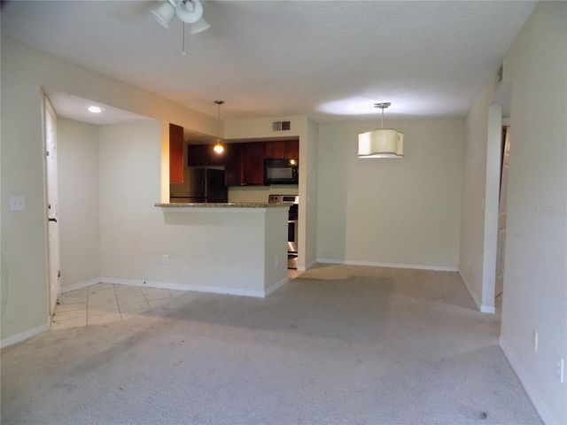 5116 CONROY ROAD 16, Orlando, FL 32811