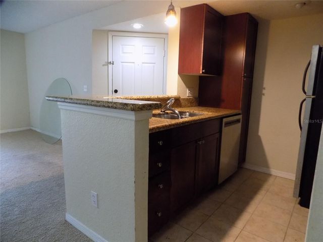 5116 CONROY ROAD 16, Orlando, FL 32811