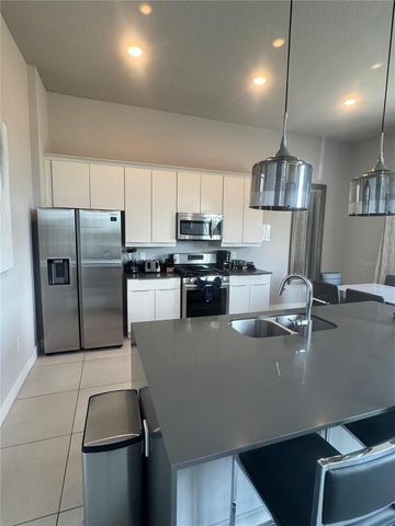 7770 SANDY RIDGE DRIVE 210, Reunion, FL 34747