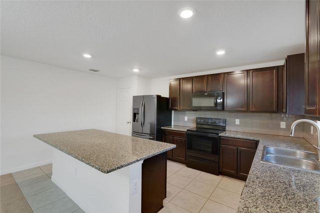 13916 RUSHING CREEK RUN, Orlando, FL 32824