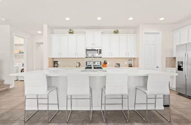 1632 NASSAU POINT TRAIL, Kissimmee, FL 34747