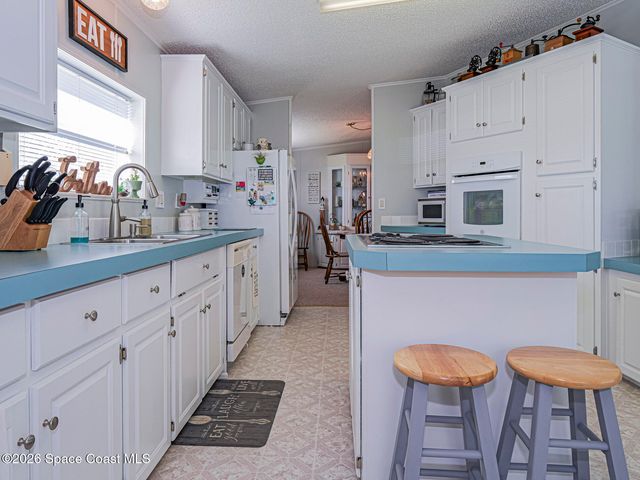 7648 Kyak Court Q16, Micco, FL 32976