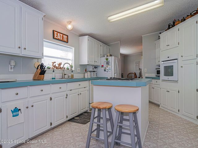 7648 Kyak Court Q16, Micco, FL 32976