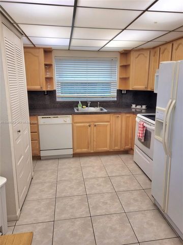 9861 Sunrise Lakes Boulevard 310, Sunrise, FL 33322