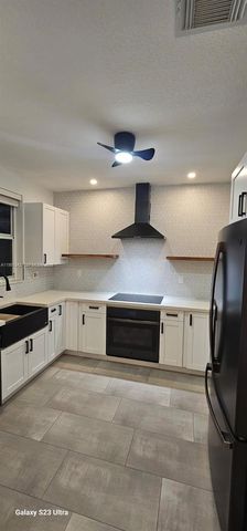 228 Riverwalk Cir, Sunrise, FL 33326