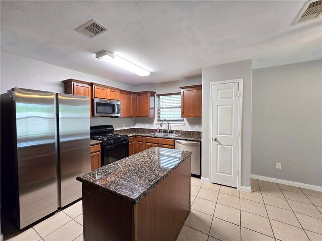 10320 Stone Gate Drive, Conroe, TX 77385