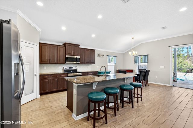 138 S HUMMINGBIRD Place, Palm Coast, FL 32164