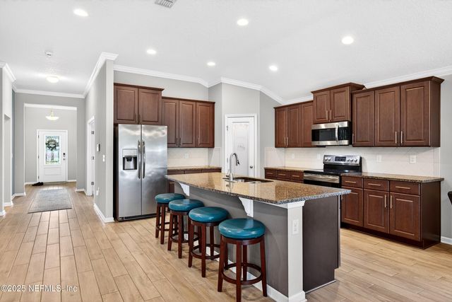 138 S HUMMINGBIRD Place, Palm Coast, FL 32164