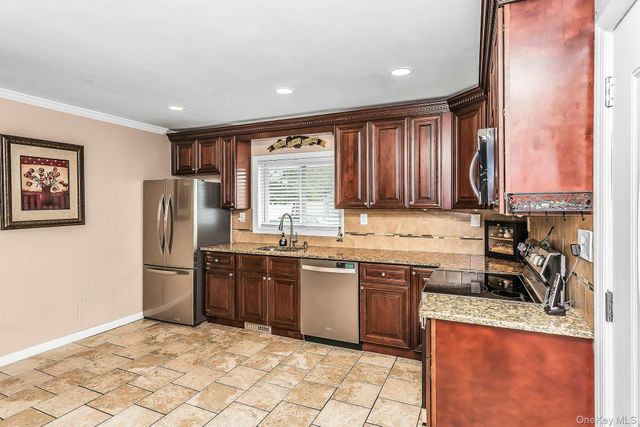 23 Summit Lane, Levittown, NY 11756