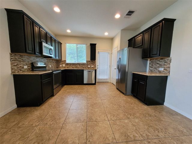 711 Rolling Oak Dr. DR 101, Round Rock, TX 78664