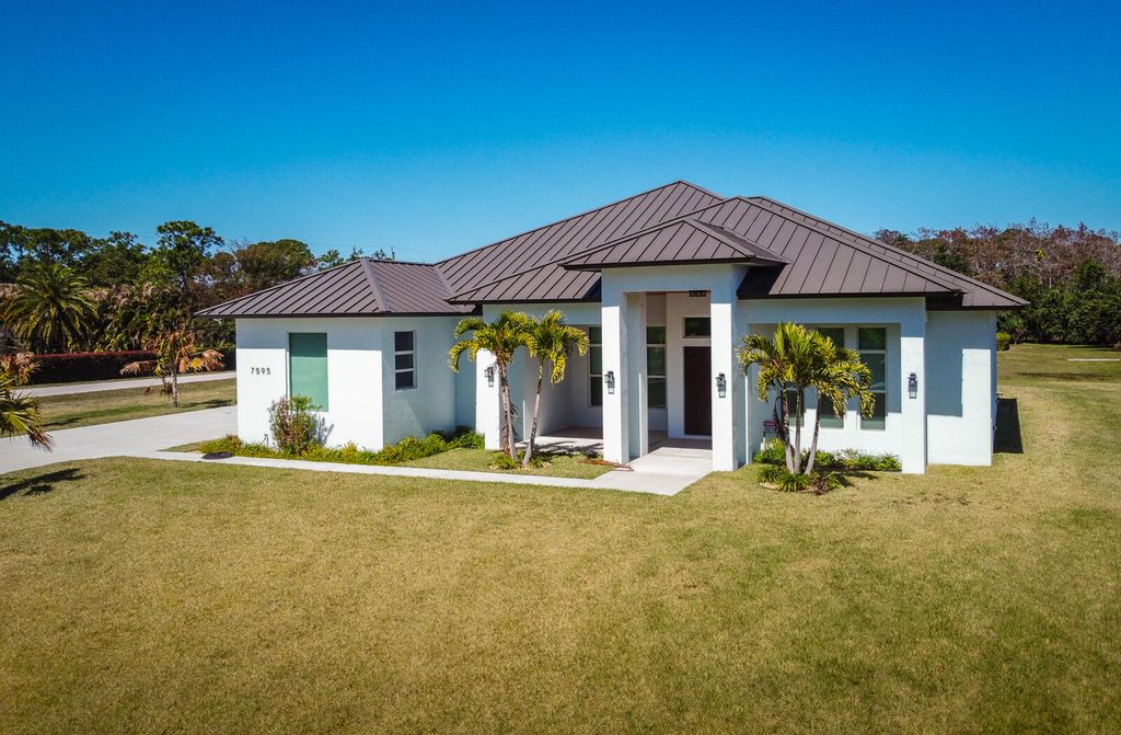 7595 155th Place N, Palm Beach Gardens, FL 33418