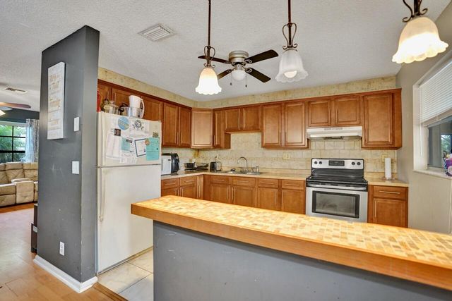 125 Seagull Court, Royal Palm Beach, FL 33411