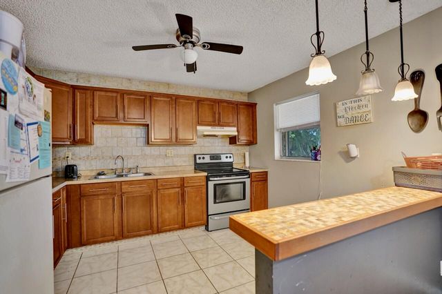 125 Seagull Court, Royal Palm Beach, FL 33411