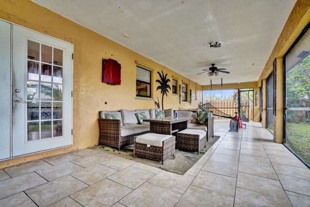 125 Seagull Court, Royal Palm Beach, FL 33411