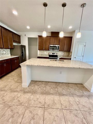 14815 MILFOIL AVENUE, Orlando, FL 32827