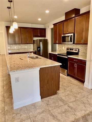 14815 MILFOIL AVENUE, Orlando, FL 32827