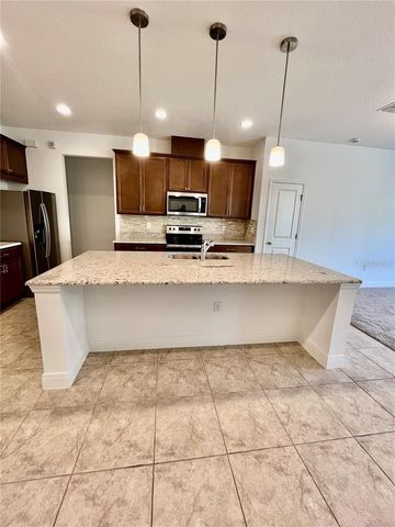 14815 MILFOIL AVENUE, Orlando, FL 32827