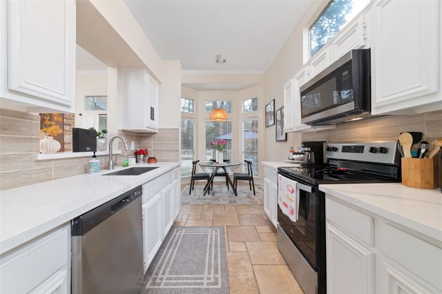 36 N Rain Forest Court, Spring, TX 77380