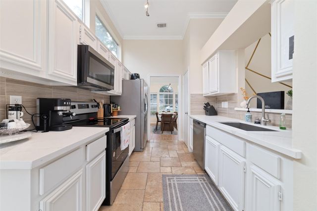 36 N Rain Forest Court, Spring, TX 77380