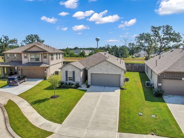 614 Coyote Canyon Court, Magnolia, TX 77354