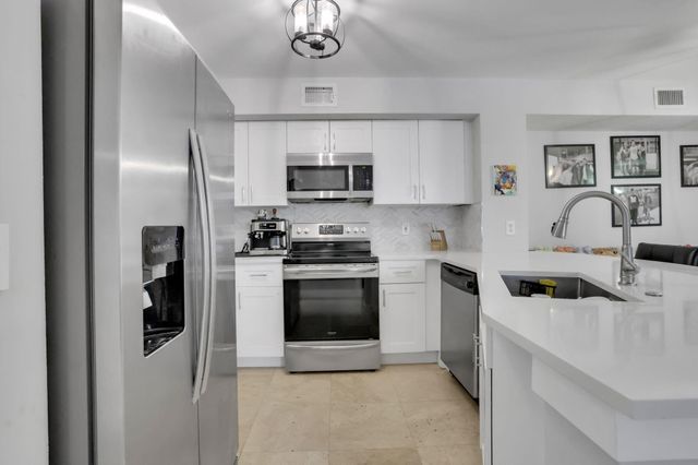 3237 CLINT MOORE Road 103, Boca Raton, FL 33496