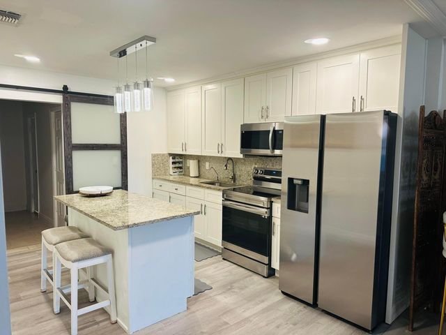 1657 MAGNOLIA Lane, West Palm Beach, FL 33417