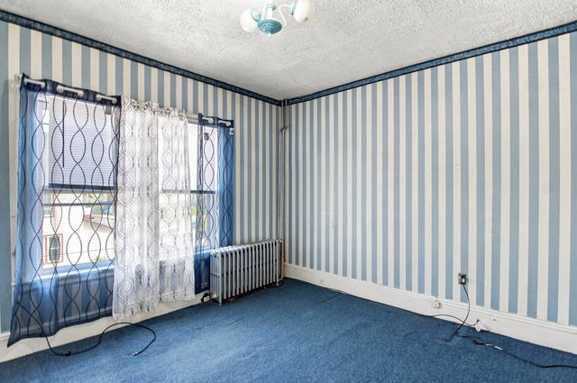 75 Woodrow Avenue, Boston, MA 02124