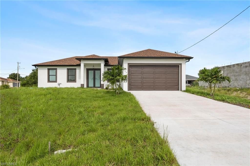 744 Oakridge AVE S, LEHIGH ACRES, FL 33974 — exterior