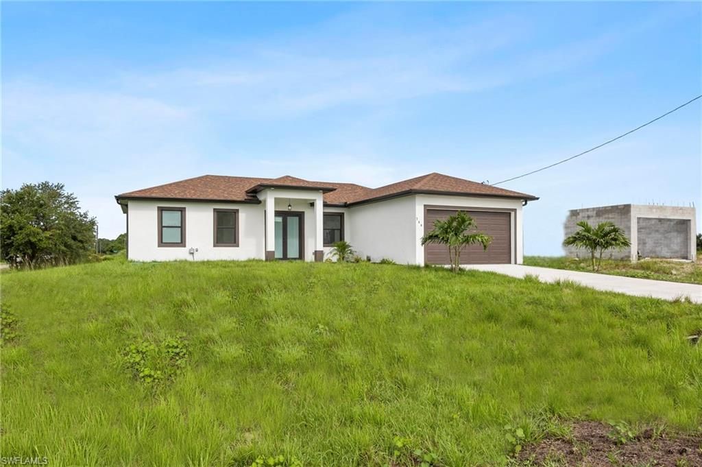 744 Oakridge AVE S, LEHIGH ACRES, FL 33974 — photo 4