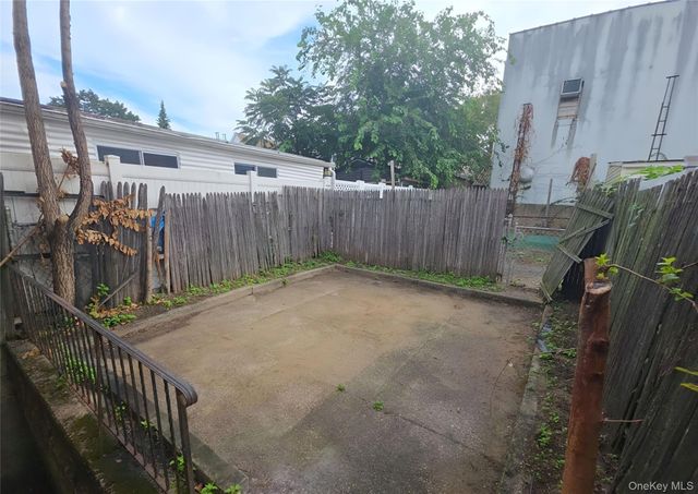 97-49 91st Street, Ozone Park, NY 11416