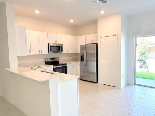 10203 TRUMPET HONEYSUCKLE WAY, San Antonio, FL 33576