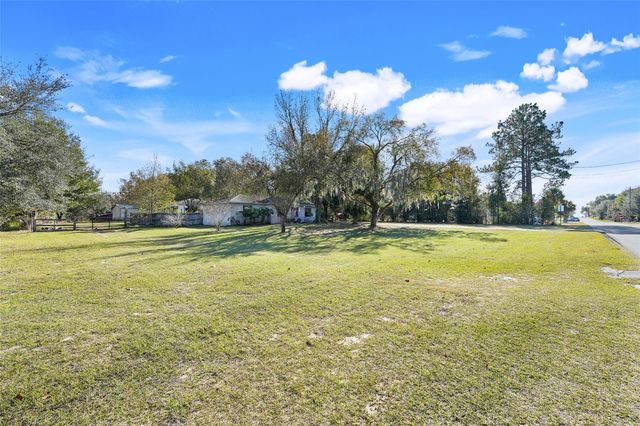 37032 GRAYS AIRPORT ROAD, Lady Lake, FL 32159