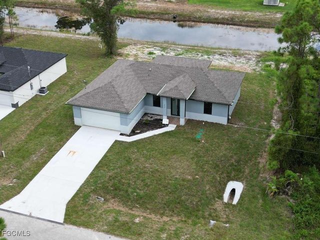 612 Ames ST E, Lehigh Acres, FL 33974